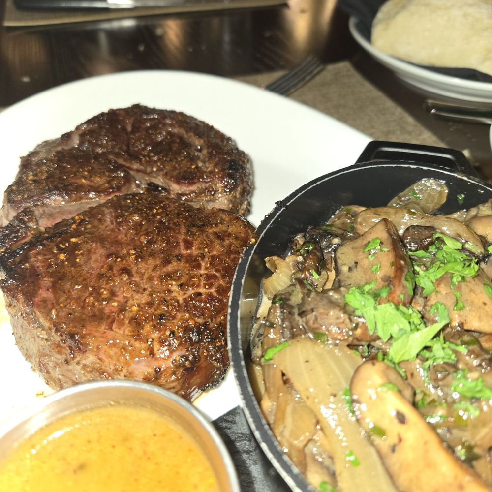 Brinkley's Chop House - Delmonico ribeye with peppercorn sauce and mushrooms and onions - Steakhouses Near Me - North Augusta, South Carolina Brinkley's Chop House - Delmonico ribeye with peppercorn sauce and mushrooms and onions - Steakhouses Near Me - North Augusta, South Carolina
