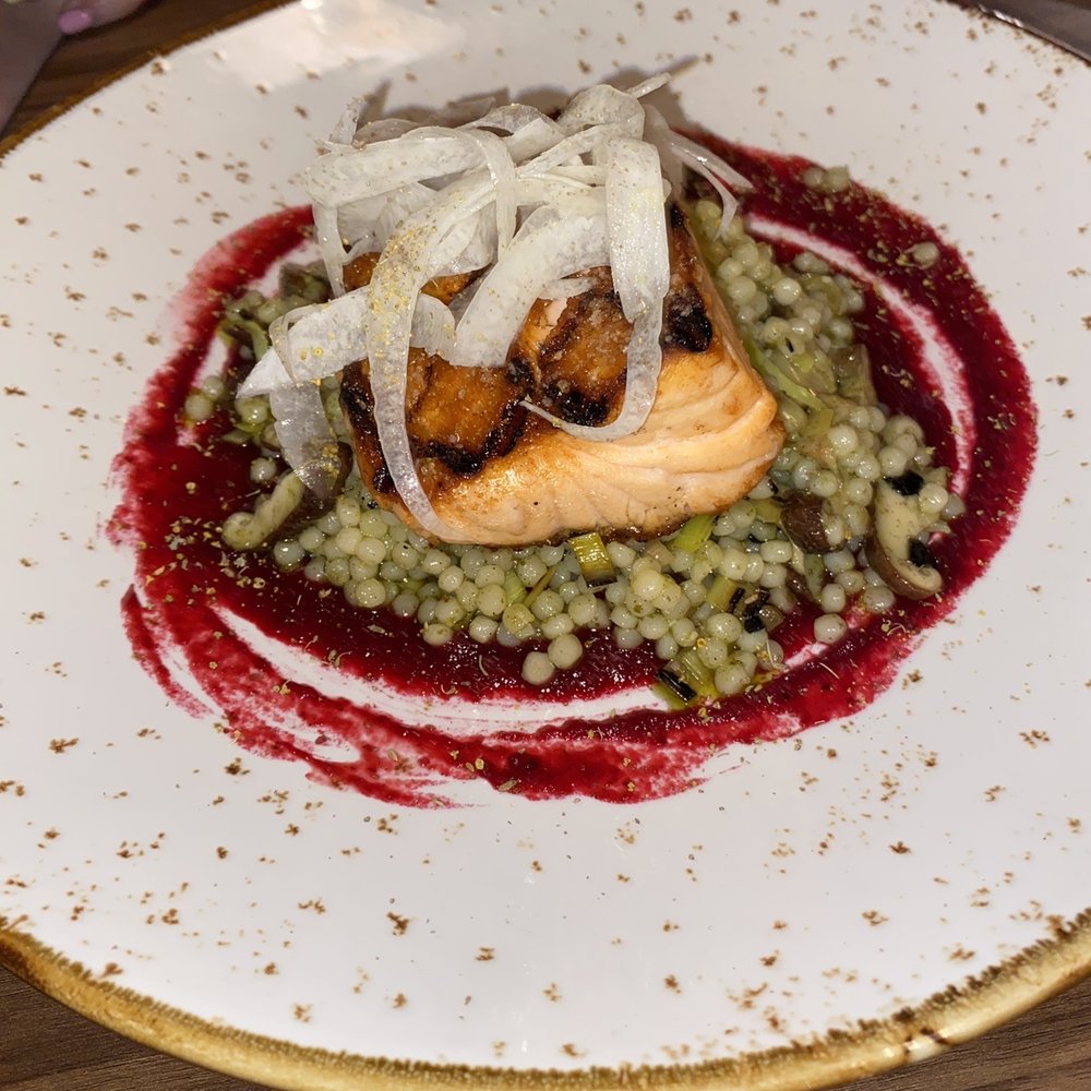 Aftermath Kitchen & Bar - Salmon with beet sauce - New American Near Me - Phoenix, Arizona Aftermath Kitchen & Bar - Salmon with beet sauce - New American Near Me - Phoenix, Arizona