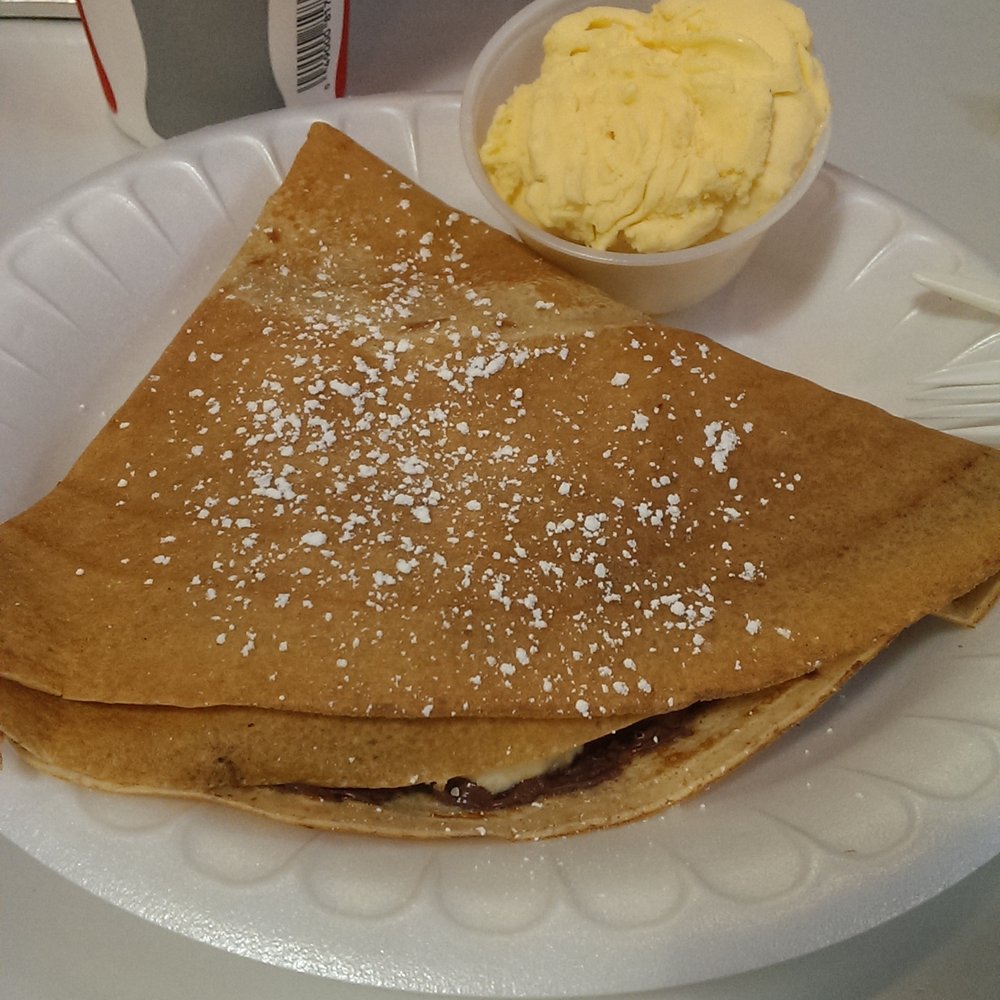 Profi's Crêperie - Hidden inside is nutella, strawberry, and banana. There's my ice cream on the side. - Creperies Near Me - Philadelphia, Pennsylvania Profi's Crêperie - Hidden inside is nutella, strawberry, and banana. There's my ice cream on the side. - Creperies Near Me - Philadelphia, Pennsylvania