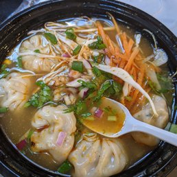Pork momos in chicken soup -- SO GOOD