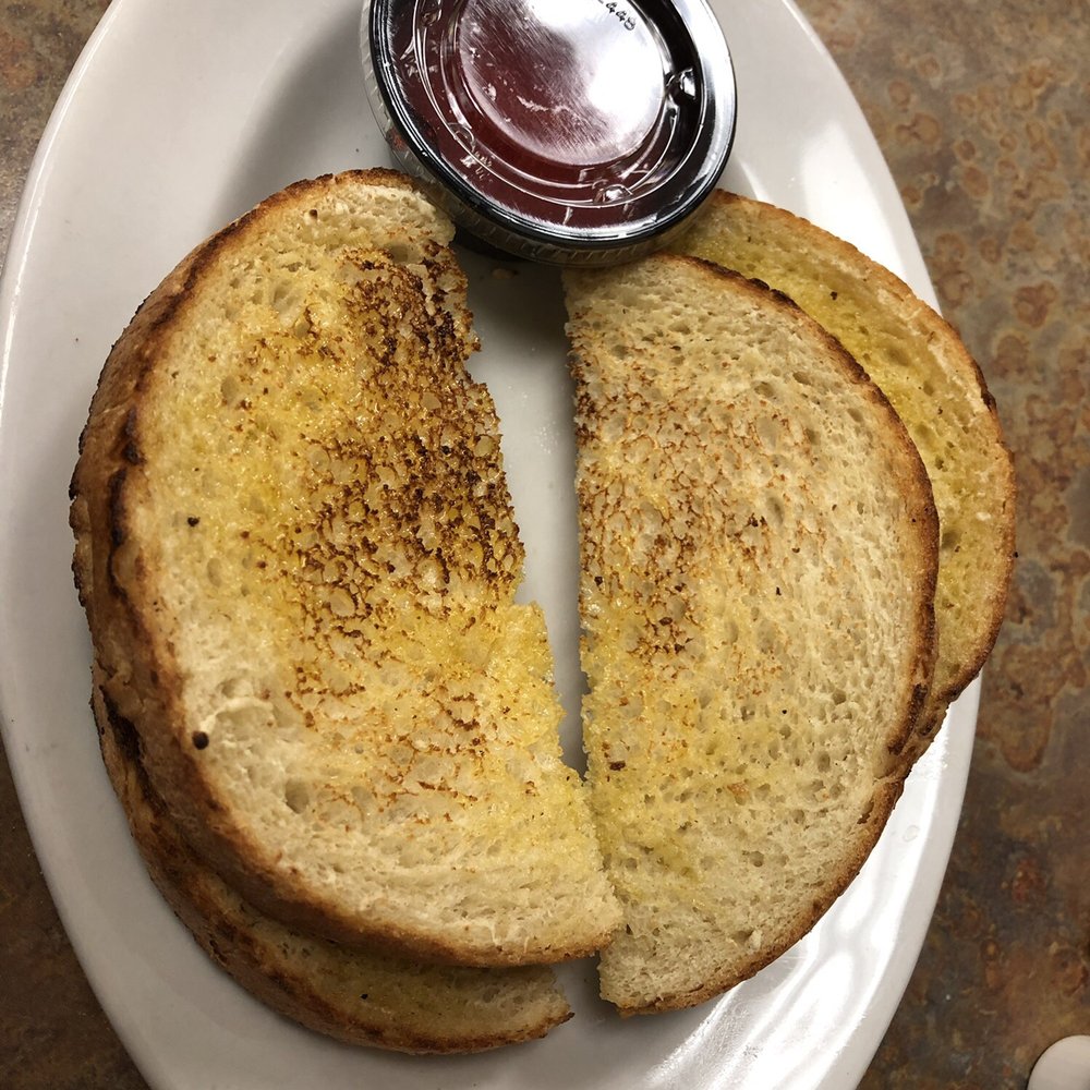 Red Geranium Cafe - English Muffin Toast with strawberry jam. - Cafes Near Me - Wyoming, Michigan Red Geranium Cafe - English Muffin Toast with strawberry jam. - Cafes Near Me - Wyoming, Michigan