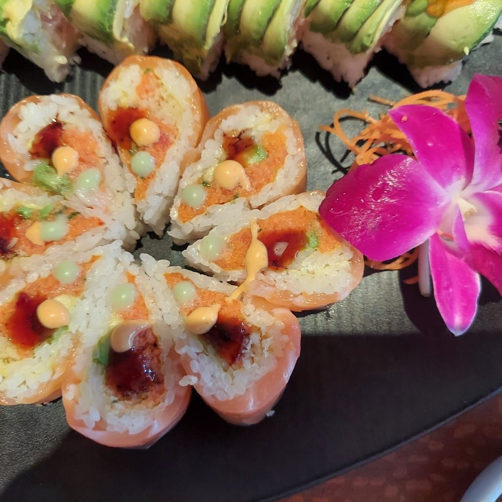 Banzai Sushi - Check out that salmon flower roll. To die for yumminess. The other one is the mango tango. Also so freakn yummy. - Sushi Bars Near Me - Denver, Colorado Banzai Sushi - Check out that salmon flower roll. To die for yumminess. The other one is the mango tango. Also so freakn yummy. - Sushi Bars Near Me - Denver, Colorado