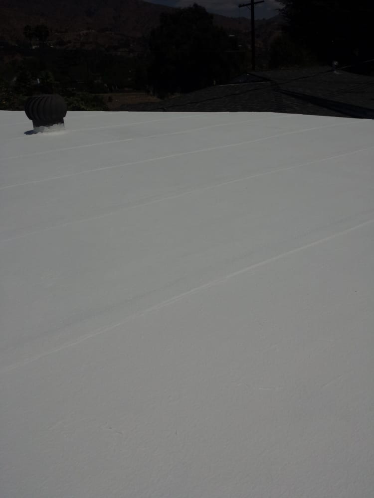 Slide of Advanced Roofing & Sons