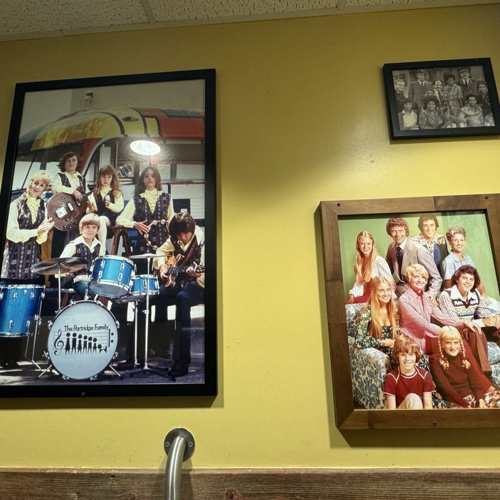 Midwood Smokehouse - Wall decor in the bathroom - classic TV sitcoms - Barbeque Near Me - Columbia, South Carolina Midwood Smokehouse - Wall decor in the bathroom - classic TV sitcoms - Barbeque Near Me - Columbia, South Carolina