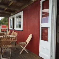 The Boatshed Cafe - Outdoor seating on the verandah