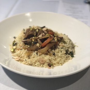 Chef's Gallery - Pork tagine on couscous - American Near Me - Dallas, Texas Chef's Gallery - Pork tagine on couscous - American Near Me - Dallas, Texas