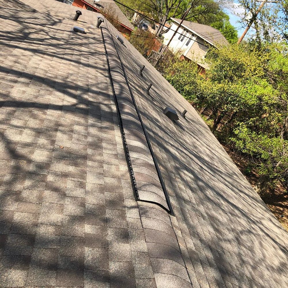 Slide of Reyes Remodeling and Roofing 2326