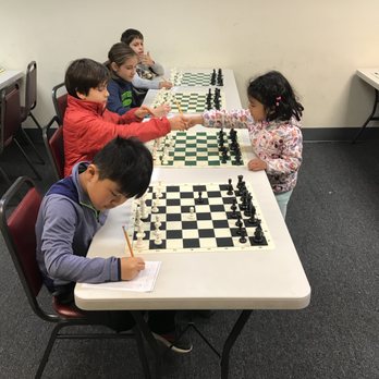 Orlov Chess Academy - Aarini plays against 8 opponents simultaneously! - Private Tutors Near Me - Seattle, Washington Orlov Chess Academy - Aarini plays against 8 opponents simultaneously! - Private Tutors Near Me - Seattle, Washington