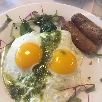 The Marshal - Sunny side eggs with polenta, spinach and sausage - Breakfast & Brunch Near Me - New York, New York