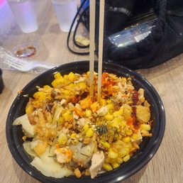 Regular bowl, brown rice, ginger, corn, mango, chicken, tofu and salmon. Regular bowl, brown rice, ginger, corn, mango, chicken, tofu and salmon.