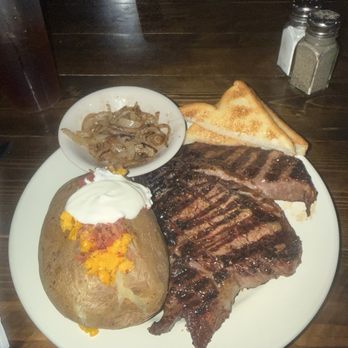Long Branch Roadhouse - Ribeye steak with loaded baked potato. You get two sides but I only wanted one. - Steakhouses Near Me - Seymour, Texas Long Branch Roadhouse - Ribeye steak with loaded baked potato. You get two sides but I only wanted one. - Steakhouses Near Me - Seymour, Texas