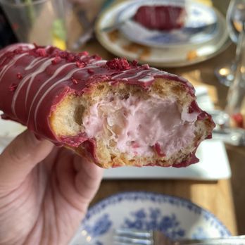 Gourmandise The Bakery - Enrobed in raspberry white chocolate dusted with freeze dried raspberry and filled with the lightest slightly sweet raspberry cream. - Bakeries Near Me - American Fork, Utah Gourmandise The Bakery - Enrobed in raspberry white chocolate dusted with freeze dried raspberry and filled with the lightest slightly sweet raspberry cream. - Bakeries Near Me - American Fork, Utah