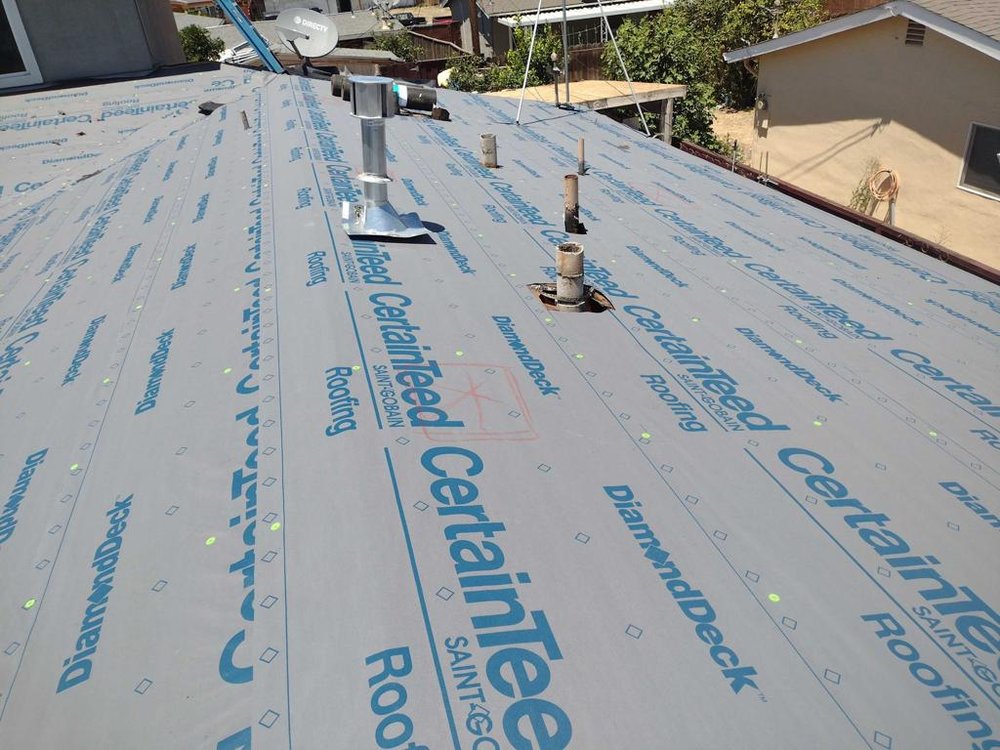 Slide of NR Roofing