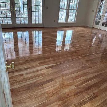 Bunker Hill Floors - a hardwood floor in a living room - Flooring Near Me
