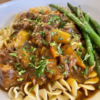 Bennett’s Casual Dining - Hungarian goulash over egg noodles - American Near Me - Sherwood, Arkansas Bennett’s Casual Dining - Hungarian goulash over egg noodles - American Near Me - Sherwood, Arkansas