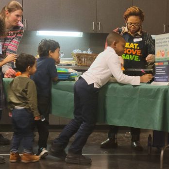 Garfield Park Conservatory - Children eagerly signing up for the next cooking class. - Parks Near Me - Chicago, Illinois