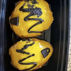 Krispy Kreme - Same donuts, different size. Charlie Brown Ornament donut.