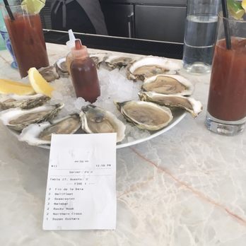 Porto - Oysters with special in-house made hot sauce - Seafood Near Me - Boston, Massachusetts Porto - Oysters with special in-house made hot sauce - Seafood Near Me - Boston, Massachusetts