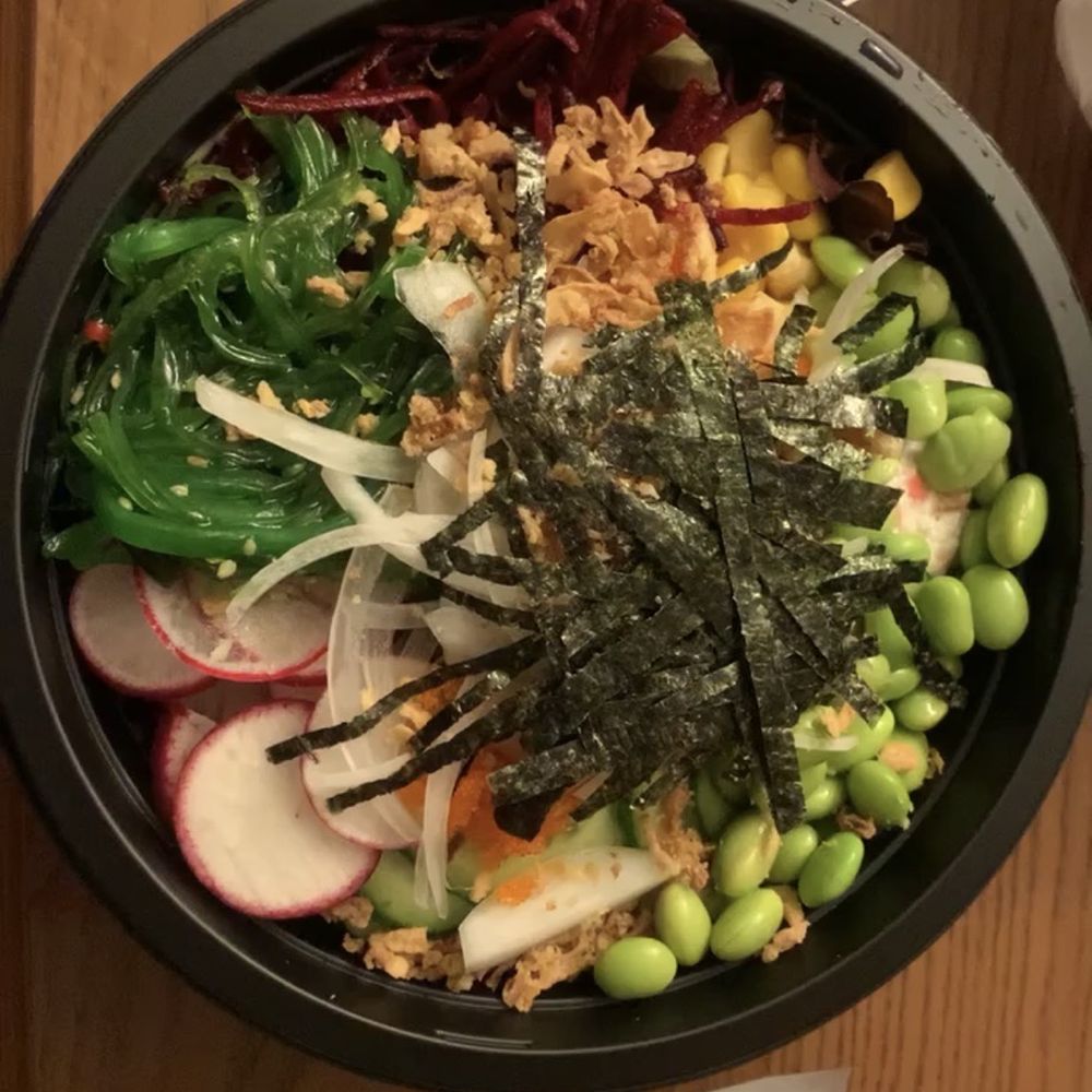 a bowl of food on a table a bowl of food on a table