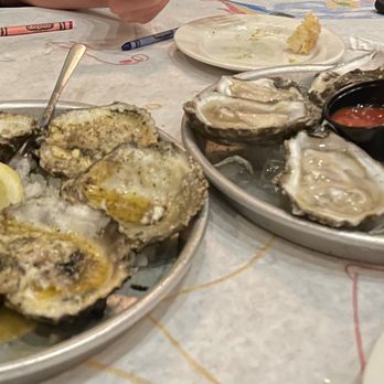 Half Shell Oyster House - Charbroiled oysters and raw oysters on the half shell - Seafood Near Me - Biloxi, Mississippi