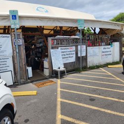 Transfer Station Thrift Store Kealakehe - This is their front entry way listing prices and hours.