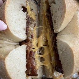 Breakfast bagel with bacon egg and cheddar