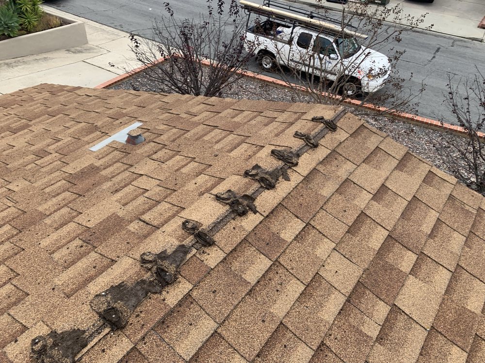 Slide of M G Roofing