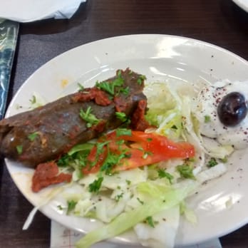 Cleo's - Oops ate the stuffed grapes leaves....one left!  It was really good, served with some goat cheese & kalamata olive. - Mediterranean Near Me - New Orleans, Louisiana