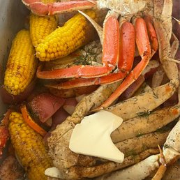 crab legs and corn on the cob