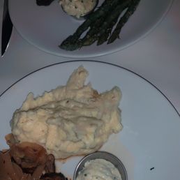 NYC strip steak with Asparagus and butcher sirloin and house mashed potatoes NYC strip steak with Asparagus and butcher sirloin and house mashed potatoes