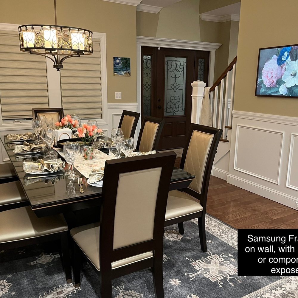 Architechnolgy Designs - Samsung frame TV installed on wall with no wires or components exposed. A big hit for entertaining - Home Automation Near Me - Melville, New York Architechnolgy Designs - Samsung frame TV installed on wall with no wires or components exposed. A big hit for entertaining - Home Automation Near Me - Melville, New York
