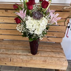 JC Florist & Gifts - Long stem red roses w lilies succulent