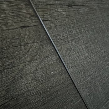 Empire Today - Peeled up flooring from Empire today - Carpet Installation Near Me