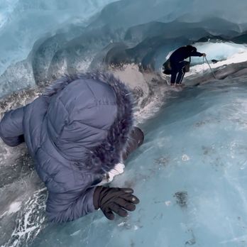 Alaska's Finest Tours & Cruises - Sliding through ice caves - Tours Near Me - Anchorage, Alaska Alaska's Finest Tours & Cruises - Sliding through ice caves - Tours Near Me - Anchorage, Alaska