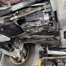 Auto Tech Smog & Repair - Here we are servicing a transmission with a new filter, gasket, and fluid.