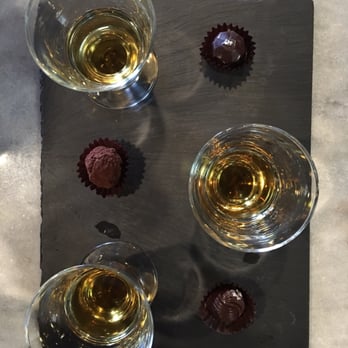 Tempered Fine Chocolates - The Bourbon/Truffle flight, served on a slate... All deliciousness! Can't think of a better way to warm up on a cold, snowy day! - Chocolatiers & Shops Near Me - Nashville, Tennessee Tempered Fine Chocolates - The Bourbon/Truffle flight, served on a slate... All deliciousness! Can't think of a better way to warm up on a cold, snowy day! - Chocolatiers & Shops Near Me - Nashville, Tennessee