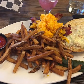 Millcreek Grille - Bacon-Cheddar Steak Burger with garlic aioli with French fries - New American Near Me - North Randall, Ohio Millcreek Grille - Bacon-Cheddar Steak Burger with garlic aioli with French fries - New American Near Me - North Randall, Ohio