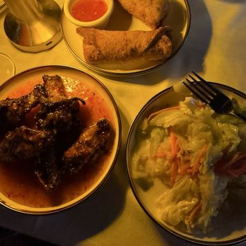 Status Hollywood - Jerk honey wings, spicy cabbage, and oxtail eggrolls. - Seafood Near Me - Los Angeles, California Status Hollywood - Jerk honey wings, spicy cabbage, and oxtail eggrolls. - Seafood Near Me - Los Angeles, California
