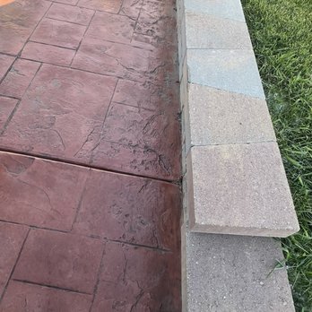 Creative Concrete and Landscaping - Wrong stamp on edge of retaining wall - Landscaping Near Me - Loves Park, Illinois Creative Concrete and Landscaping - Wrong stamp on edge of retaining wall - Landscaping Near Me - Loves Park, Illinois
