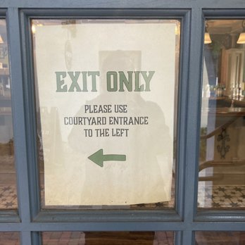 St George Inn - The slamming Exit door from Distillery directly below the bed in the King Suite room 63.  AVOID ! - Hotels Near Me - Saint Augustine, Florida