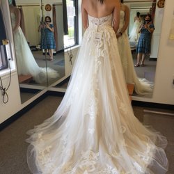 Manee's Tailoring & Alterations - She took in the sides, adjusted the skirt, and added a bustle. It fit so well and looked fantastic!