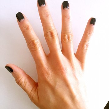 Jewel Nails - It's a clear fat and short triangle who's points start at the base corners of the nail and the remaining nail covered in black polish. - Nail Salons Near Me - Morganville, New Jersey