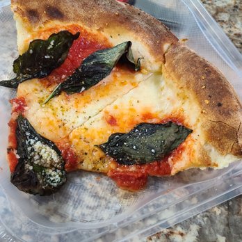 Pizza 216 - Margherita pizza with basil put on it before baking! Completely burned - Bars Near Me - Cleveland, Ohio Pizza 216 - Margherita pizza with basil put on it before baking! Completely burned - Bars Near Me - Cleveland, Ohio