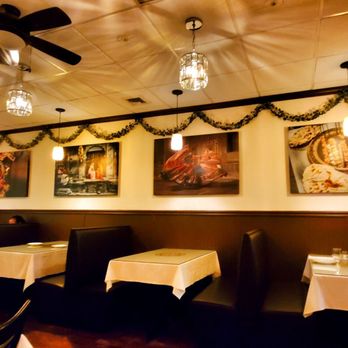 Mango Indian Cuisine - the interior of the restaurant - Indian Near Me - Bellmore, New York Mango Indian Cuisine - the interior of the restaurant - Indian Near Me - Bellmore, New York