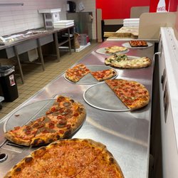 Pizza Tascio Overland Park - Pizza by the slice choices.