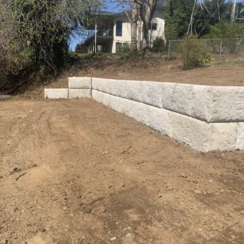 Soil And Erosion Technologies - Wall from lower terrace - Excavation Services Near Me