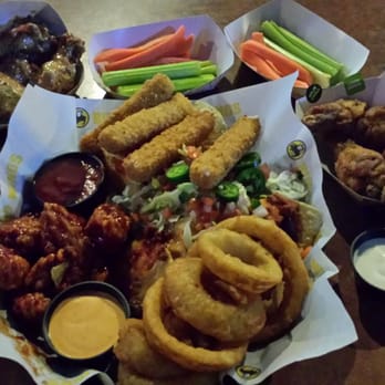 Buffalo Wild Wings - Parmesan garlic wings ($7.29), lemon pepper wings ($7.29) & the sampler ($13.99) - Chicken Wings Near Me - Corona, California Buffalo Wild Wings - Parmesan garlic wings ($7.29), lemon pepper wings ($7.29) & the sampler ($13.99) - Chicken Wings Near Me - Corona, California