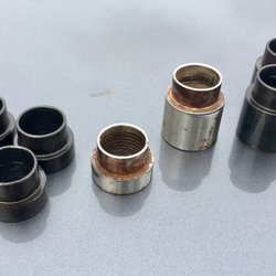 Tri Tool - Bearing misalignment spacer, new black and old stainless.