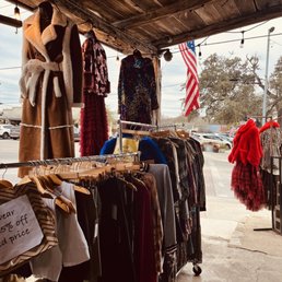 Exterior outside entrance of Wall Street Western - Sale rack - Wimberley, Texas Exterior outside entrance of Wall Street Western - Sale rack - Wimberley, Texas