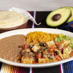 Los Hermanos Mexican Restaurant - Ruby Special - your choice of meat sauteed with pico de gallo in our own special wine sauce.